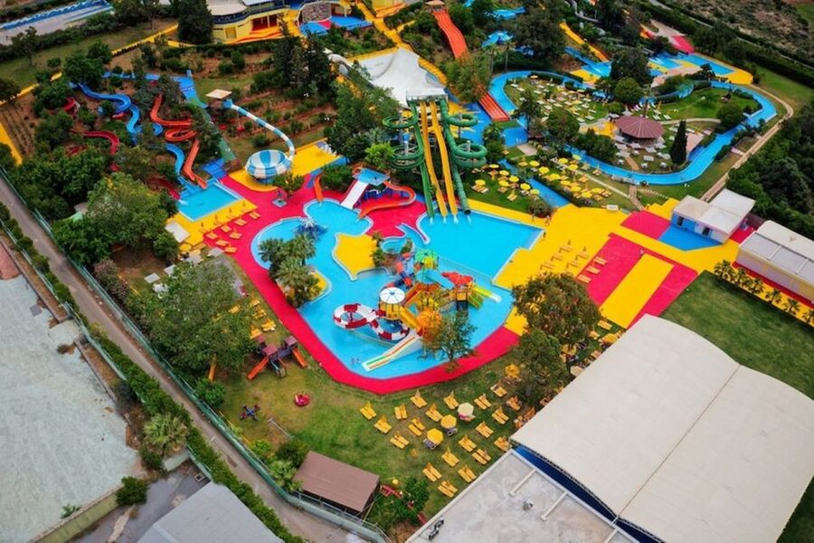 Acqua Plus Water Park Admission with Optional Transfer - Gardens, shade, and cooling off between rides