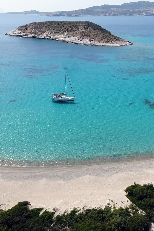 Adamantas: Full-Day Milos & Poliegos Boat Tour with Meals - Sarakiniko Beach: Volcanic Rock Swimming and Snorkeling