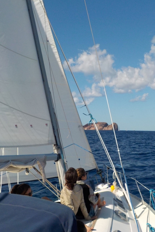 Adamantas: Milos Sightseeing Sailboat Cruise - The early sailing along Milos: catacombs, Klima, and Akra Vani photo moments
