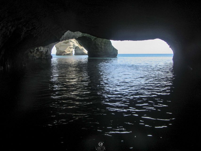 Adamantas: Milos Sightseeing Sailboat Cruise - Sykia cave: green water snorkeling, dinghy passage, and the salt lake light