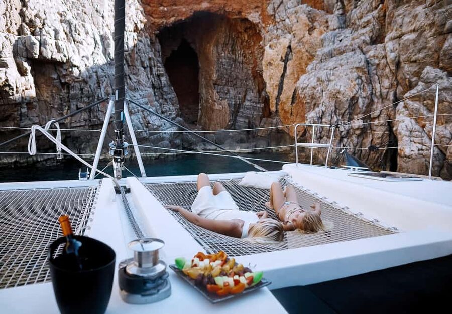 Agios Nikolaos All-inclusive Catamaran Cruise & Water Toys - Spinalonga photo stop, plus a quick tasting break