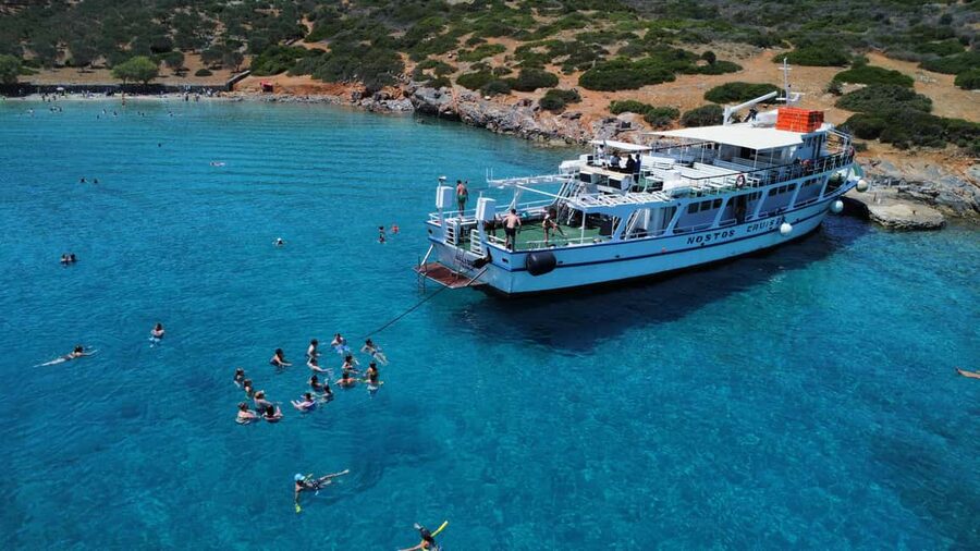 Agios Nikolaos: Fun Cruise Around Elounda Bay - Onboard Vibe: DJ Music, Local Raki, Cocktails, and BBQ Snacks