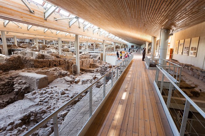 Archaeological Bus Tour To Akrotiri Excavations & Red Beach - Pickup and timing, what to expect on the bus