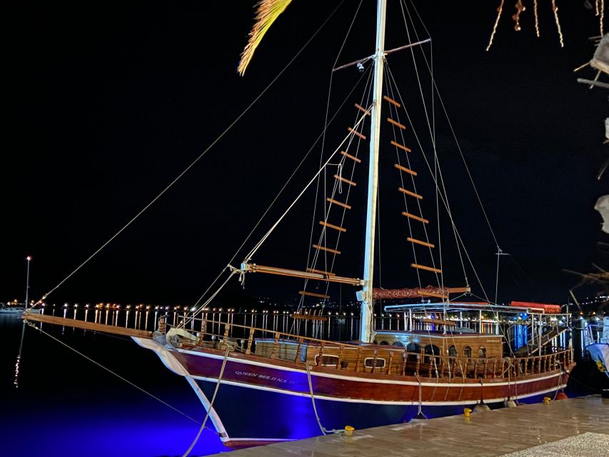Argostoli: Sunset Cruise with Swim Stops, Dinner, and Wine - Dinner Under the Mediterranean Sky: Moussaka, Salad, and Wine That Keeps Flowing