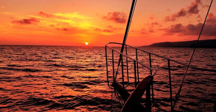 Argostoli: Sunset Cruise with Swim Stops, Dinner, and Wine - Snorkeling Masks, Paddle Boards, and Practical Water Time Tips