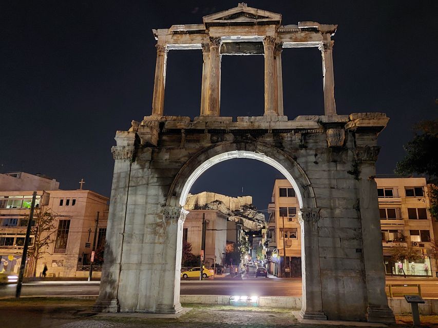 Athens: City Highlights Nighttime Walking Tour in Spanish - The opening stretch: National Library, University, and Academy of Athens
