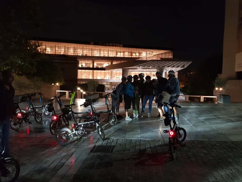 Athens: Discover the City Electric Bike Night Tour - Syntagma Square at night, plus the guards changing under moonlight