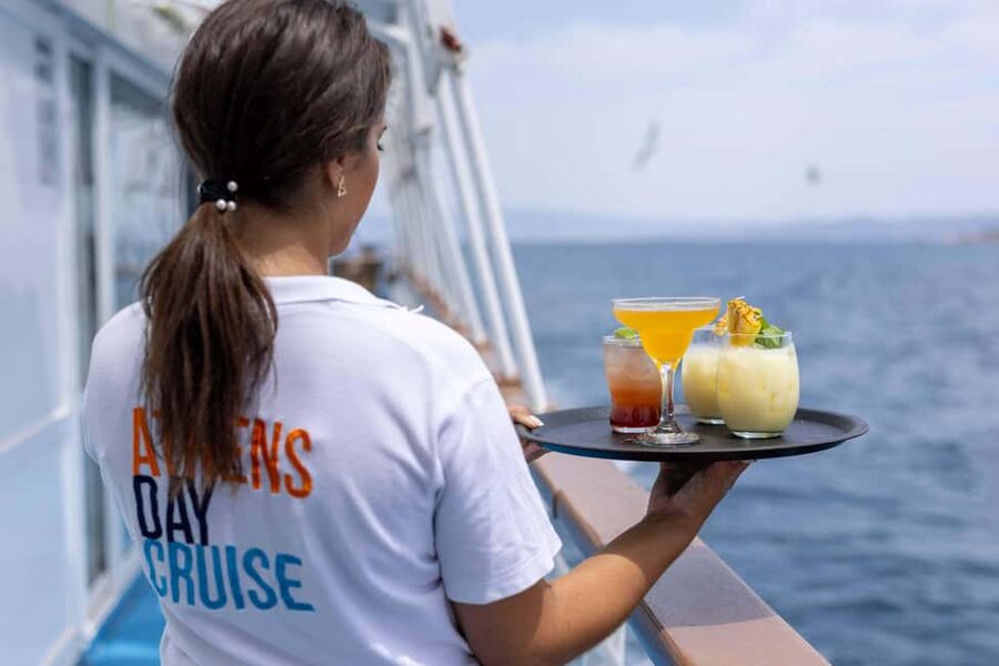 Athens: Islands Swimming Day Cruise. DJ, Lunch & Drinks inc. - Lunch on the Saronic Gulf: Greek buffet, unlimited drinks, and how the day flows