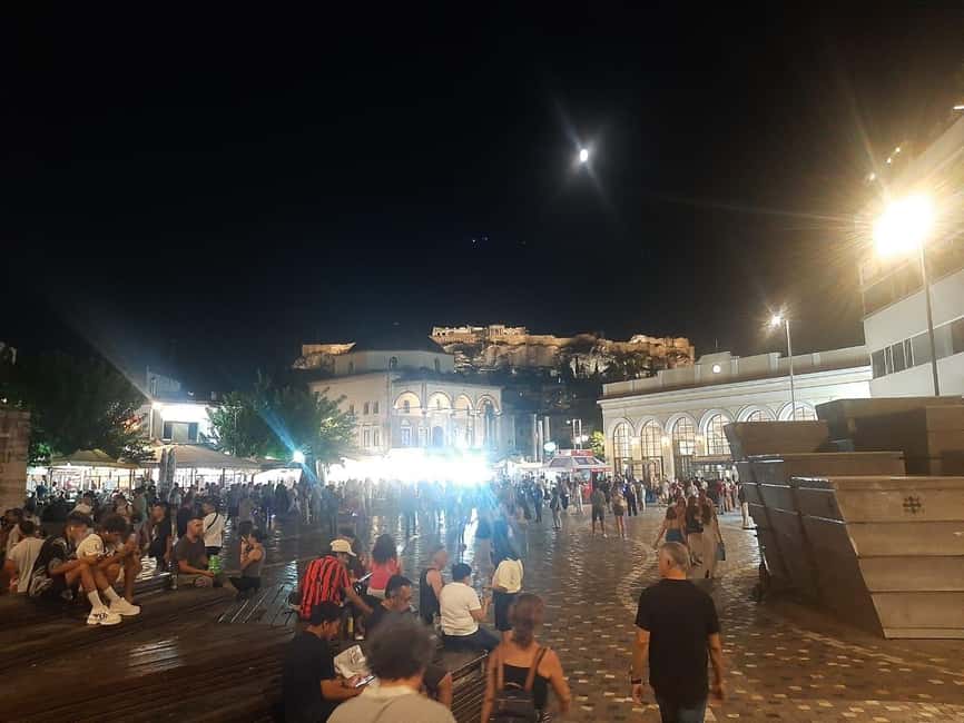 Athens panoramic tour by night with open double decker bus - A nighttime viewpoint from an open double-decker bus