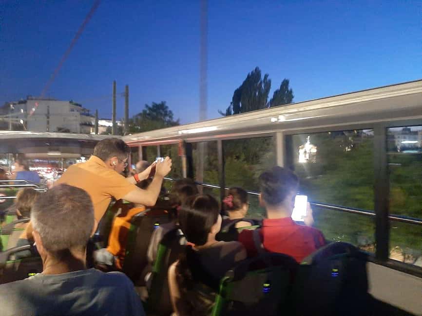 Athens panoramic tour by night with open double decker bus - Hellenic Parliament, National Library, and Acropolis Museum pass-bys