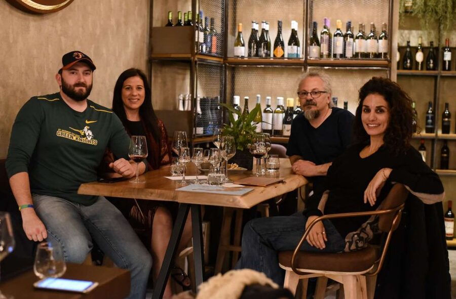 Athens: Premium Food and Wine Tasting Tour in the evening - Aperitif and streetside flavors before the wine bar