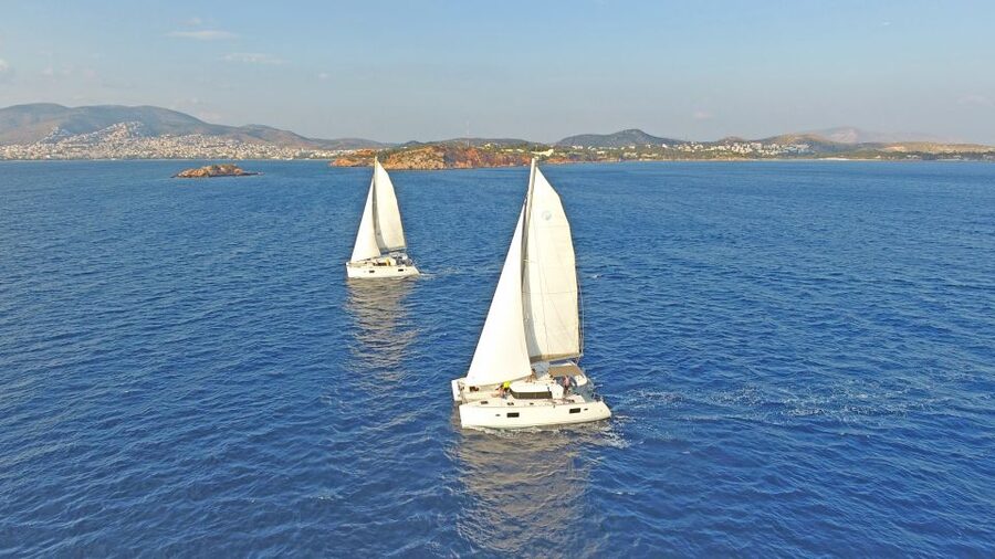 Athens: Riviera Catamaran Cruise with Meal and Drinks - First hour on the water: welcome drink, sun time, then sailing