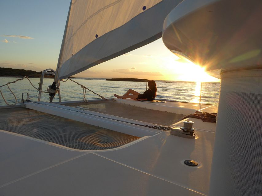 Athens: Riviera Catamaran Cruise with Meal and Drinks - Swim stop #2 at Vouliagmeni: the lunch anchor and the best lounging