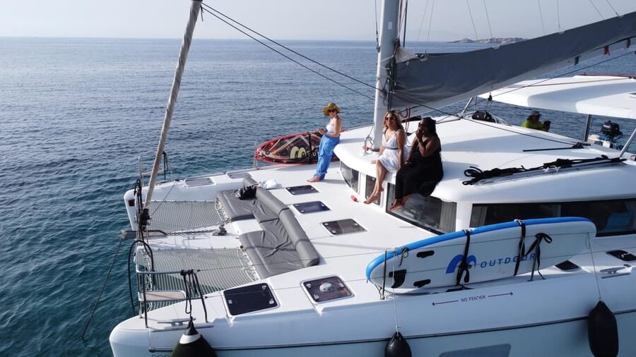 Athens: Riviera Catamaran Tour with Fresh Meal and Drinks - Vouliagmeni and Asteras Bay: calm water where swimming feels effortless