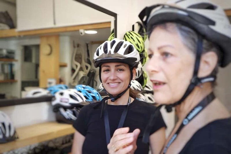 Athens: Small Group E-Bike Tour of Historic Highlights - Zappeion and Roman Baths ruins, a smart closer with lots of context
