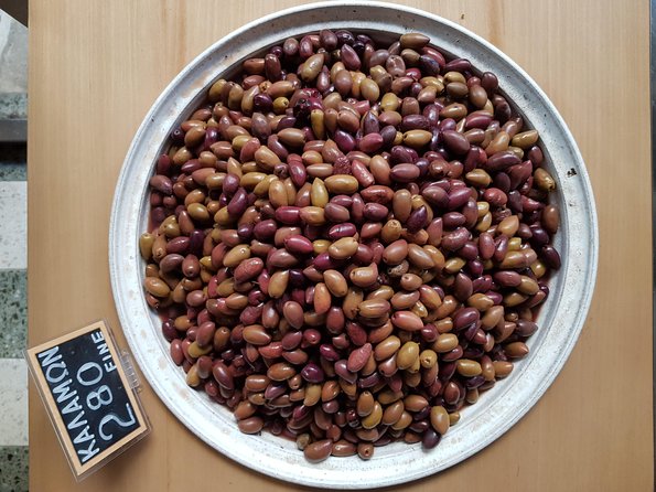 Athens: The Classic Food Tasting Tour - Cretan Culture Tasting Round: Cheese, Olives, Rusks, Olive Oil, and Raki