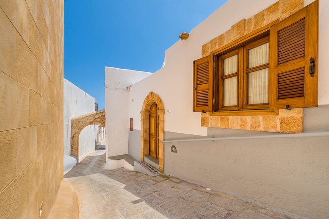 Boat Trip to LINDOS with Swimming Stops at Anthony Quinn's & Tsambika Bays - Tsambika Bay Stop: A Short, Famous Splash