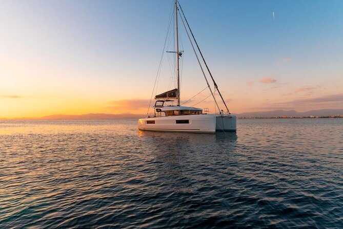 Catamaran Day & Sunset Cruises with meals Drinks and transportation - Rhenia Island Swim Stop: Where the Cruise Becomes a Beach Day