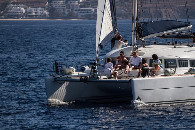Catamaran Day & Sunset Cruises with meals Drinks and transportation - Onboard Food and Drinks: Homemade Rose Wine and a Hot Meal Timing