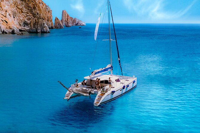Catamaran Full-Day of Milos and Poliegos With Lunch & BBQ - Kalogries Beach: Clear Water Time Without a Ticket Hassle