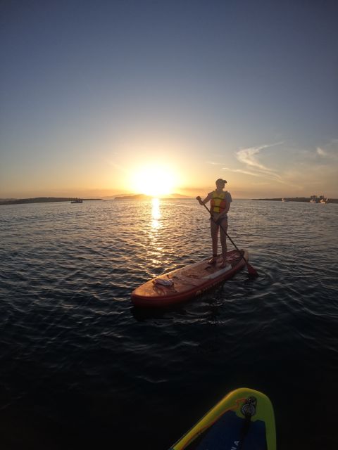 Chania: Stand-up Paddleboard Coastal Sunset Experience - Entering the SUP sunset at SUPn’ Blue near Chania’s lifeguard tower