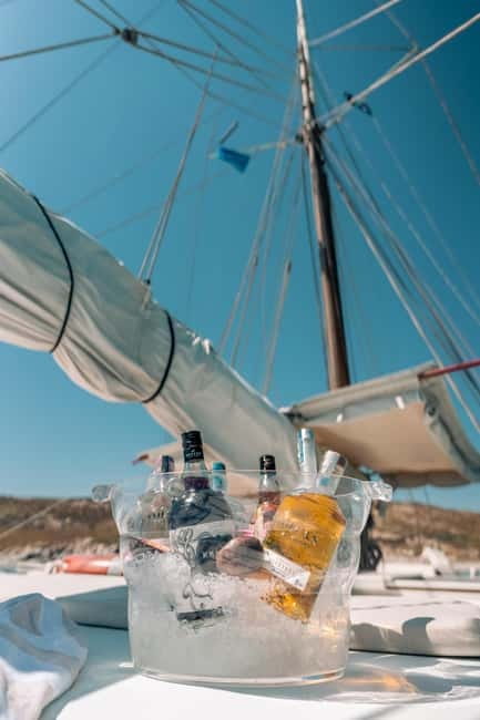 Corfu: Blue Lagoon and Cave Cruise with Drinks and Lunch - ODYSEIA at Benitses Marina: the logistics that set the tone