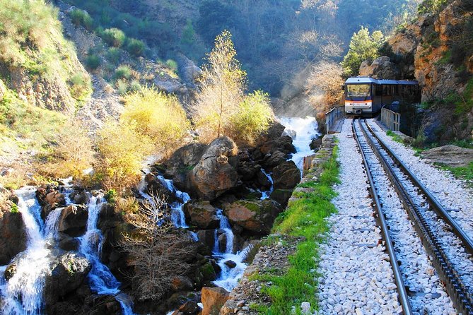 Corinth, Cave of Lakes, Odontotos Railway Private Tour with Greek Lunch Included - Kalavrita lunch and walking: where the day turns into mountains