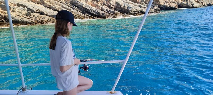 Crete: Fishing & Swimming Boat Cruise with Lunch & Drinks - Sea Caves, Snorkeling, and Swimming in Clear Water