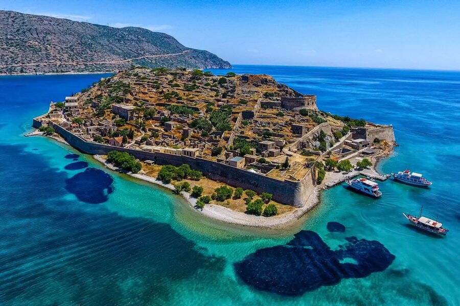 Crete: Spinalonga, Elounda, & Agios Nikolaos Boat Tour & BBQ - Why this Spinalonga day trip feels different from a quick cruise