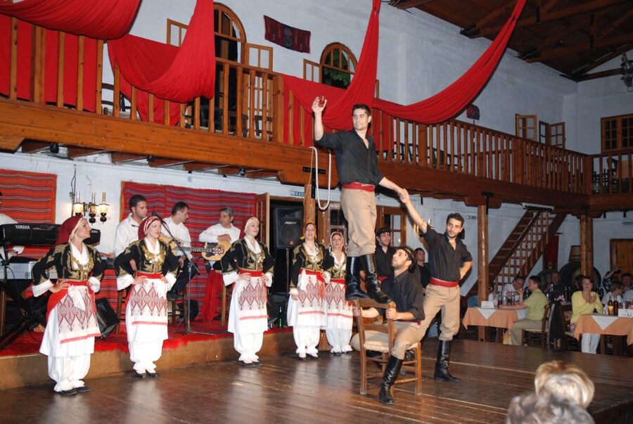 Crete: Traditional Dance Show and Buffet Dinner with Wine - The dance show: Cretan costumes, singer, and the big social energy