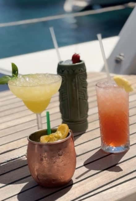 Dia: Day & Sunset Cruise with Menu by Greece's Top 100 Chef - Day cruise versus sunset cruise, and why timing changes the feeling