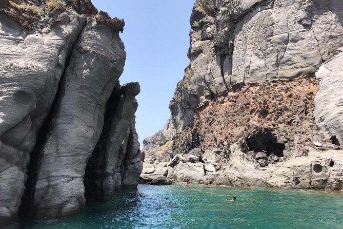 Explore Santorini’s volcano with Alex Private Boat Rental - The Fira Old Port stop: a quick reality check before the fun