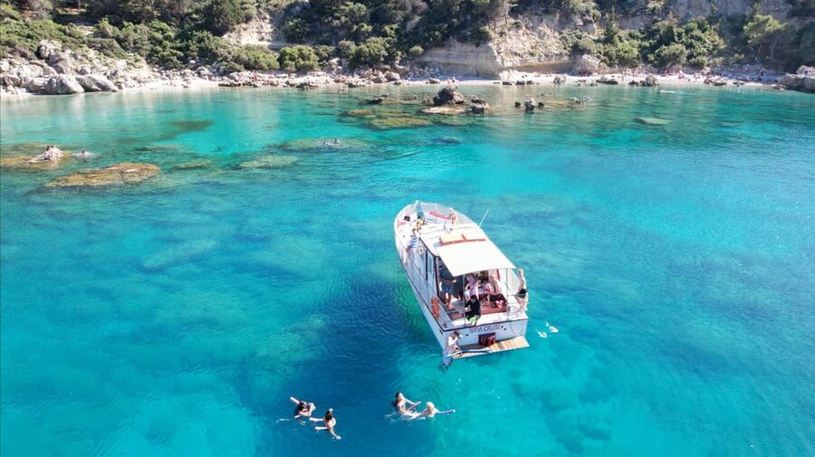 Faliraki: Boat Trip to Afantou Caves, Antony Quinn, Ladiko - On Board: Benches, Music, Safety Floats, and Included Drinks