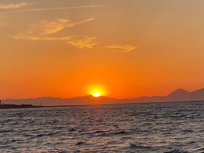 Faliraki: Evening RIB Cruise with Champagne and Sunset Views - Meeting the Boat by Stama Restaurant, and What to Bring