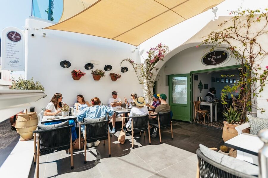 Fira: Guided Foodie Walking Tour with Tastings - The Daily Market Stop: Fresh Fish, Vegetables, and Local Rhythm