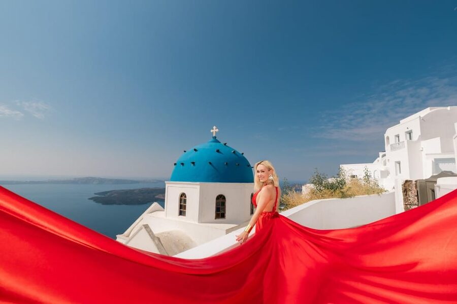 Flying dress Photoshoot in Santorini with Hotel Pickup - Imerovigli Photo Session: Blue Domes, White Walls, and Caldera Views