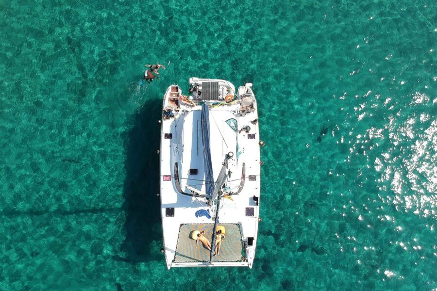 From Adamas: Milos and Poliegos Catamaran Cruise with Lunch - The Crew Factor: Dina, Forrest, and Yannis (John)