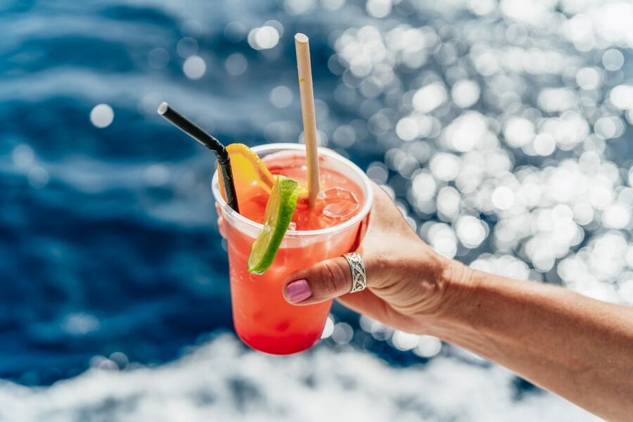 From Corfu Island: Antipaxos & Paxos Blue Caves Boat Cruise - Seats, bar, and the onboard vibe on Ionian Cruises