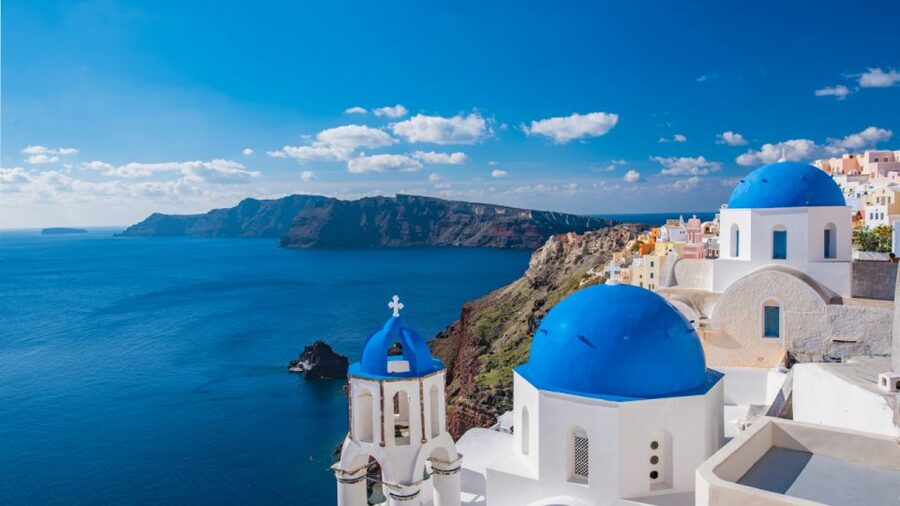 From Heraklion/Crete: Santorini Island Guided Day Trip - Oia with a guide, blue domes, cliff views, and real alley time