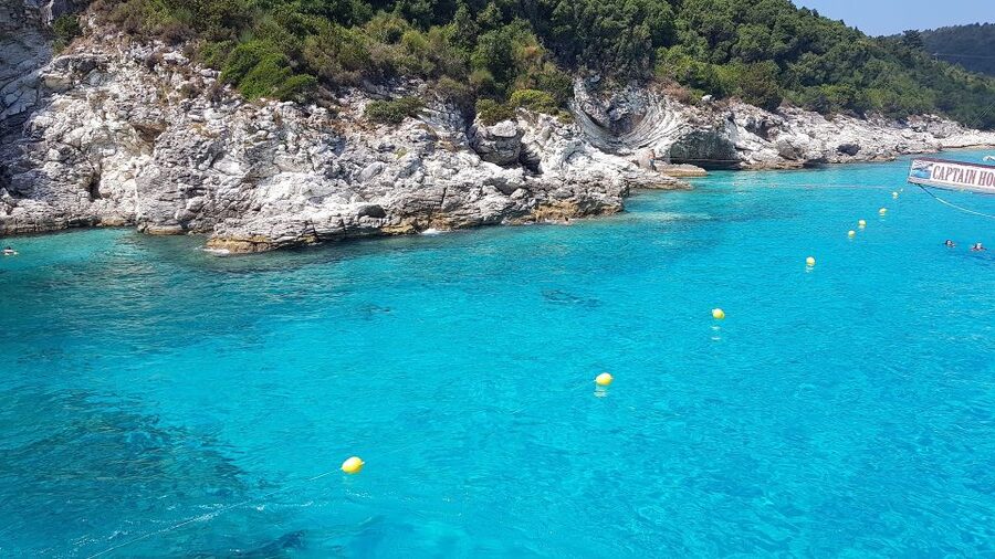 From Lefkimmi: Paxos, Antipaxos & Blue Caves Boat Tour - Getting to the boat: Corfu pickup is part of the deal, and it is location-limited