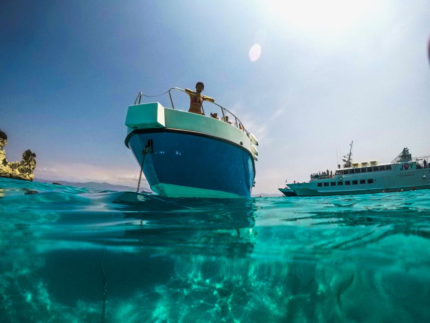 From Lefkimmi: Syvota, Blue Lagoon and Cave Sunset Cruise - Hidden coves and the kind of swimming you actually remember