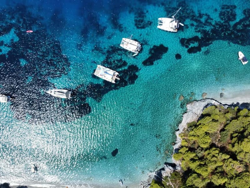 From Skiathos Marina: Yacht Sailing Day Trip with Lunch - Swim stop 1: Lararia or Tsougria coves