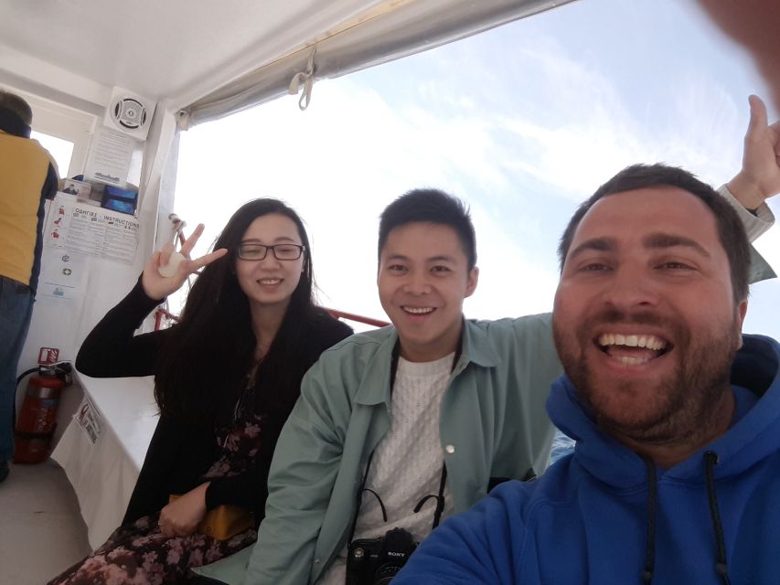 From St.Nikolaos: Boat Cruise to Navagio Beach & Blue Caves - Blue Caves on a glass-bottom boat: spotting fish and marine life