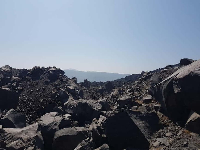 From Thera: Thirasia Cruise w/ Volcano Hike and Hot Springs - The live guide and commentary: why it’s more than background noise