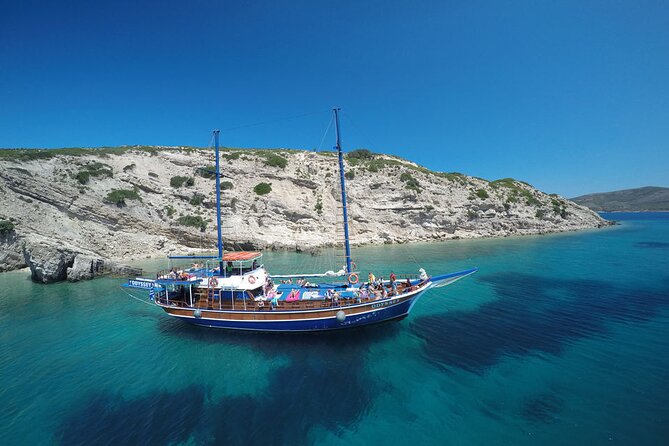 Full Day 3-Island Boat Cruise from Port of Kos - Plati islet swim stop: clear water, easy time in the sea, and happy hour on the move