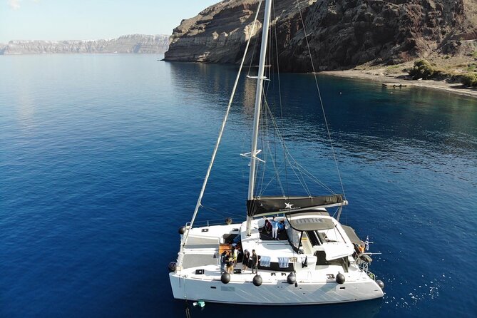 Half-Day Exclusive Catamaran Cruise in Santorini with Meal and Open Bar - Getting to Vlychada Marina without taxi stress