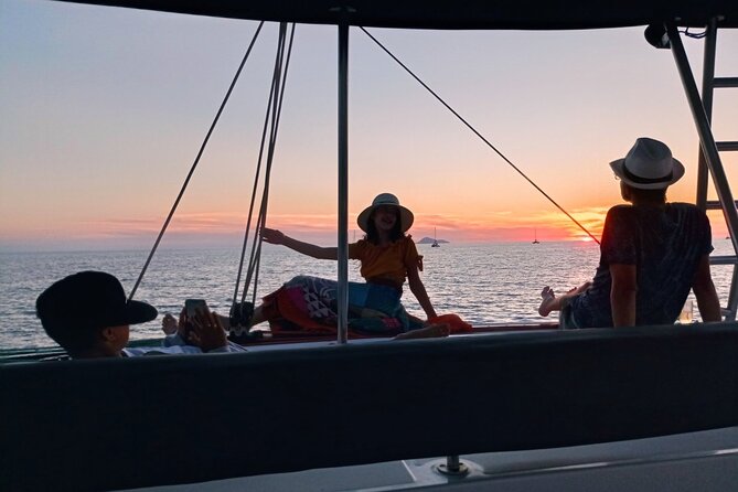 Half-Day Exclusive Catamaran Cruise in Santorini with Meal and Open Bar - Red Beach: the color drama, plus a quick swim window