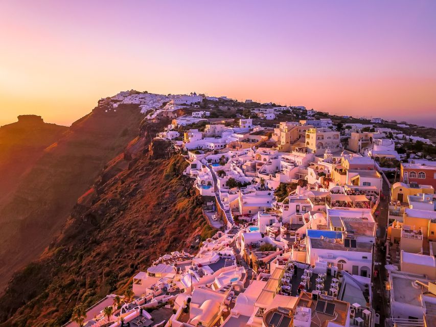 Heraklion: Santorini Day Trip with Boat Transfer & Oia Visit - Reaching Oia: Caldera rim views with a guided path