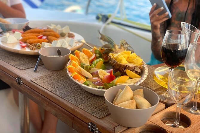 Hersonissos: Luxury Sunset Catamaran Cruise Sushi & Open Bar - Crew care and the motion sickness reality check