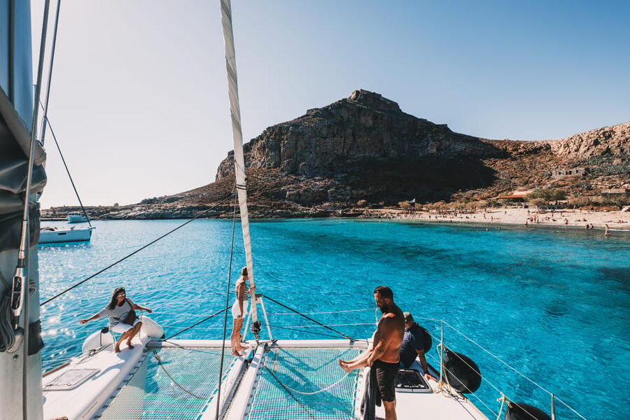 Kissamos: Balos & Gramvousa Luxury Catamaran Sailing Cruise - Kissamos port pickup and the catamaran vibe you feel fast